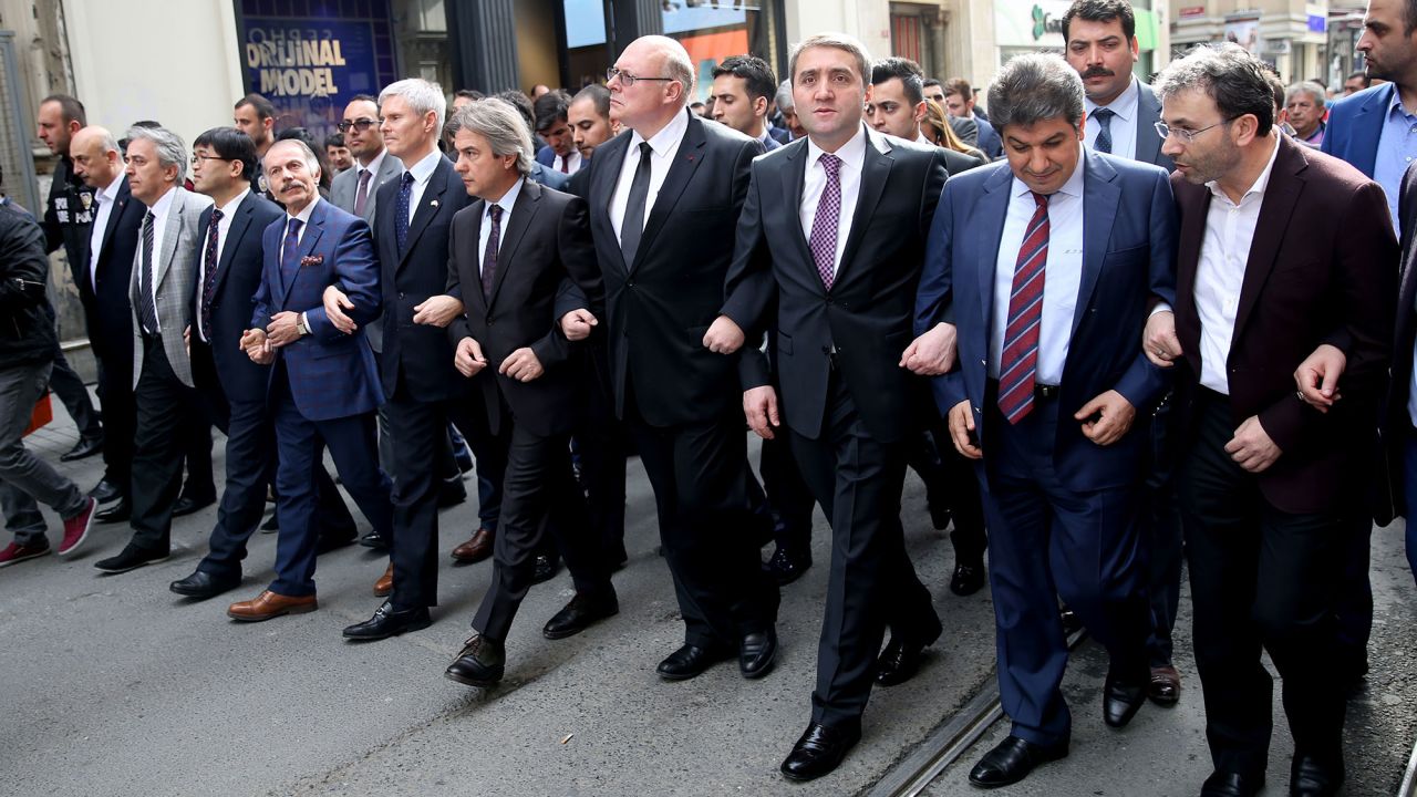 Mayors of Istanbul districts walk with consuls from various countries, including Belgium, during a protest condemning terrorism on March 22.