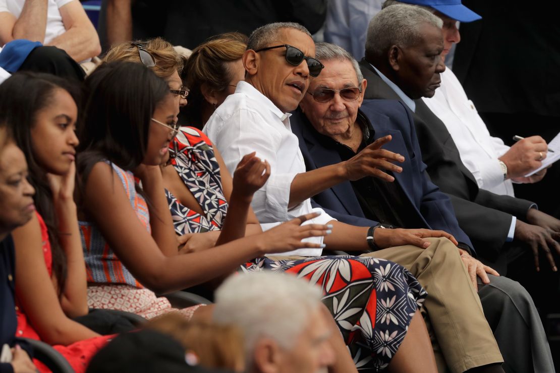 U.S. President Barack Obama and Cuban President Raul Castro visit during an exhibition game between the Cuban national team and the Major League Baseball team Tampa Bay Devil Rays at the Estado Latinoamericano March 22, 2016 in Havana, Cuba.