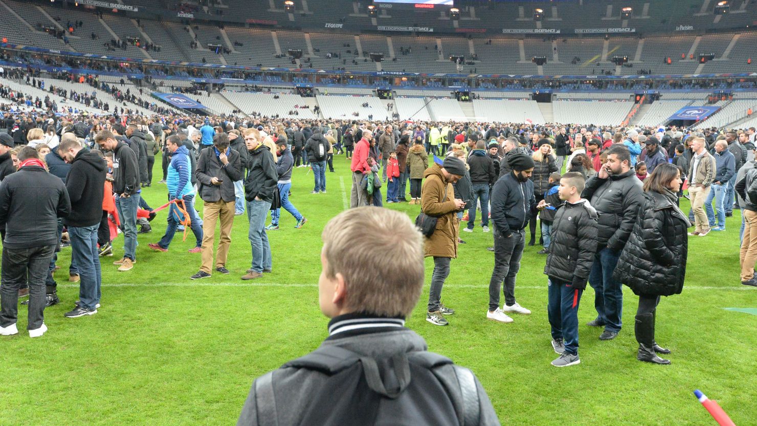 Spectators at the Stade de France stadium after the Paris terror attacks in November 2015.