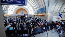 LOS ANGELES, CA - MAY 27:  Travelers wait to get screened at the American Airlines terminal at the start of the Memorial Day holiday weekend at Los Angeles International Airport on May 27, 2011 in Los Angeles, United States.  More than 35 million people are expected to travel over the weekend.  (Photo by Kevork Djansezian/Getty Images)