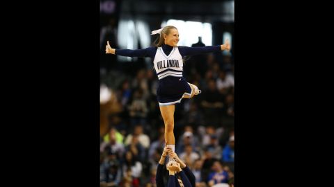 A Villanova cheerleader performs during a tournament game on Sunday, March 20.