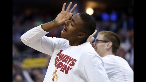 Iowa State players Simeon Carter, left, and Stuart Nezlek celebrate from the bench during a second-round game on Saturday, March 19.