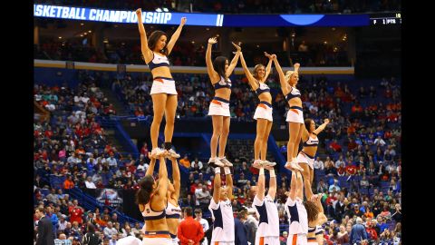 Syracuse cheerleaders perform during a first-round game on Friday, March 18.