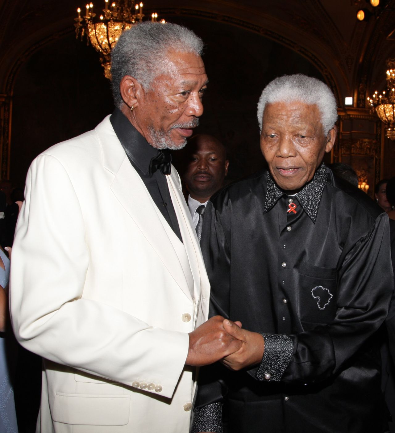 Morgan Freeman, who played Nelson Mandela in the 2009 film "Invictus," is pictured with the South African president at a gala dinner in Monaco two years earlier.