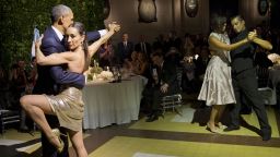 President Barack Obama and first lady Michelle Obama dance the tango with tango dancers during the State Dinner at the Centro Cultural Kirchner, Wednesday, March 23, 2016, in Buenos Aires, Argentina.
