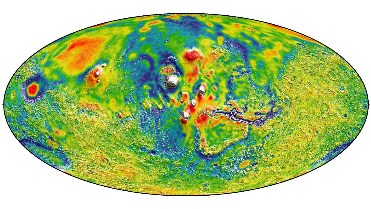 Gravity map of Mars shows Tharsis volcanoes. White and red are areas of higher gravity; blue lower.