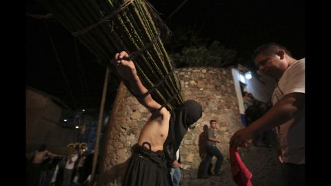 In Taxco, Mexico, penitents march while whipping their backs or carrying thorny sticks.