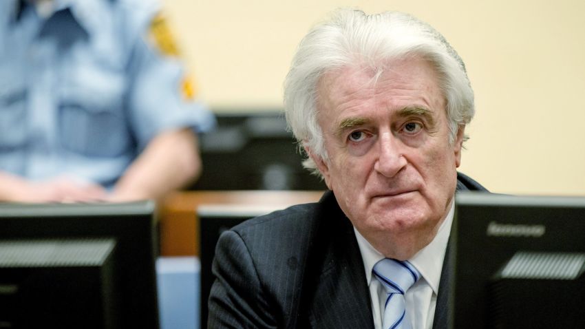 Former Bosnian Serb leader Radovan Karadzic listens to the verdict at the International Criminal Tribunal for the former Yugoslavia in The Hague.
