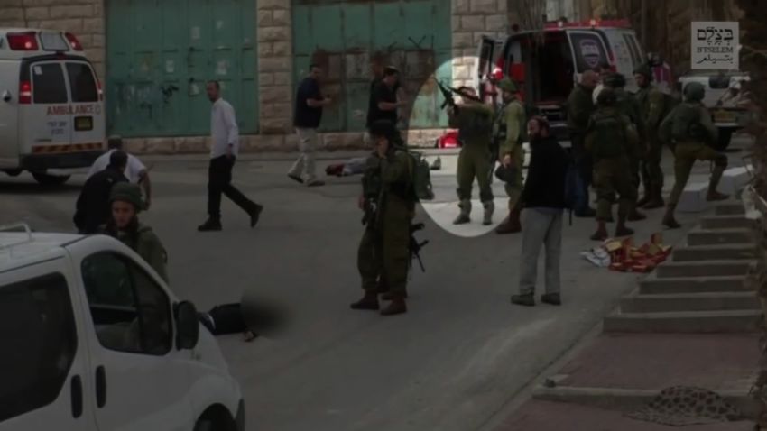 israeli soldier shoots attack suspect