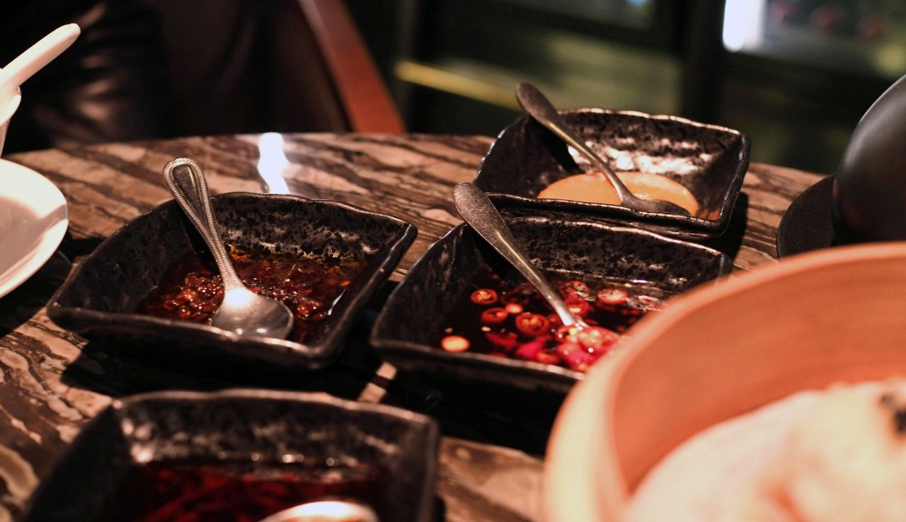 There are three styles of chili sauces at Mott 32. Yu kwen yick, an orange chili paste with a unique sour finish, is a Hong Kong favorite condiment.