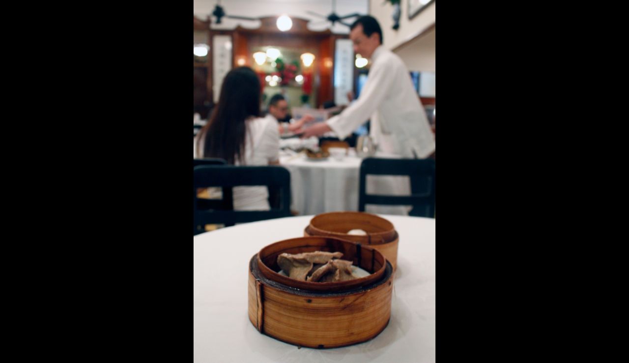 Luk Yu's service may be intimidating and its dim sum mediocre, but it should be tried at least once for its rare old school Hong Kong glamor.