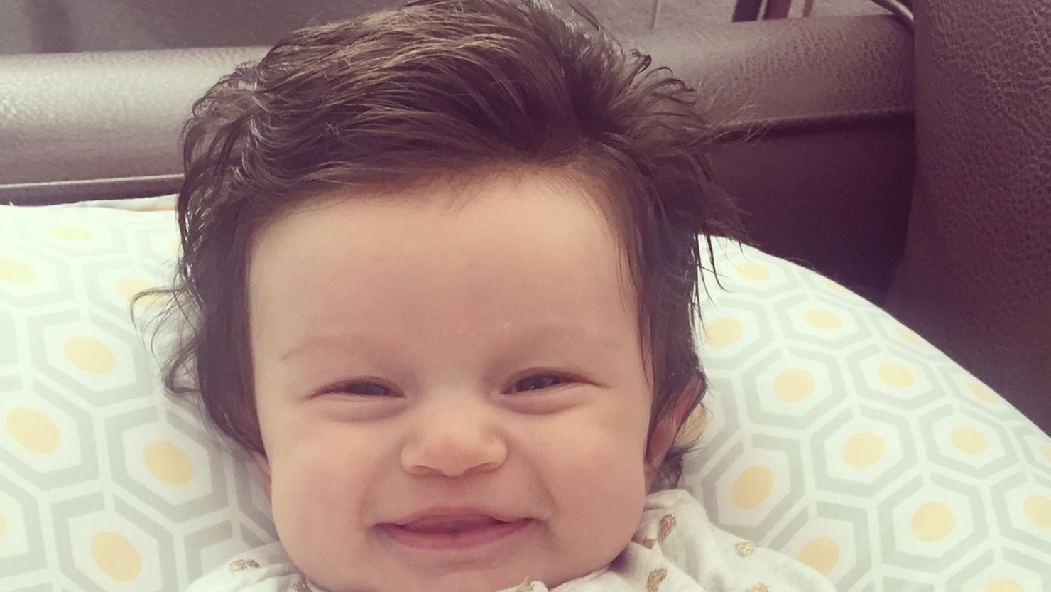 David and Mackenzie Kaplan's daughter has gone viral for her full head of hair. 