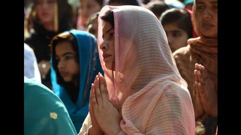 Pakistani Christians attend Mass to mark Good Friday at St. Anthony's Church in Lahore on March 25.