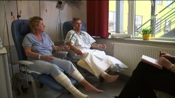 A  Belgian soldier helped Phillipe Breyer after the bomb "ripped off" his leg. "We want to thank him," said his wife Catherine