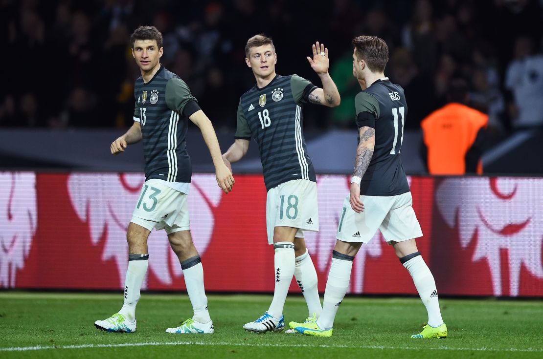 Toni Kroos celebrates scoring the opener for Germany in Berlin.