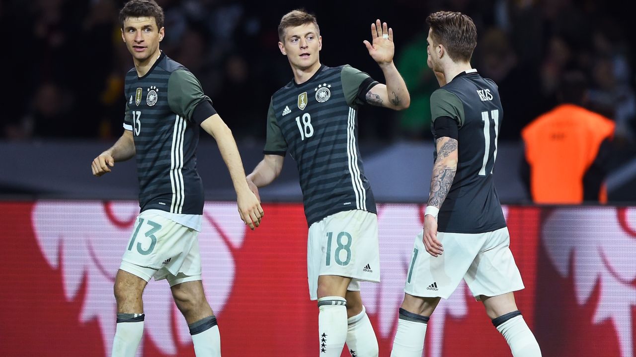 Toni Kroos celebrates scoring the opener for Germany in Berlin.