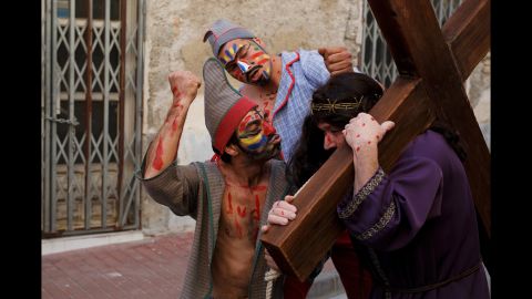 Actors representing "los Judios" and Jesus Christ take part in "La Judea" along the streets of Cuevas del Almanzora, Spain, during a Holy Friday procession on Friday, March 25. Certain families in the city have kept this tradition alive for more than 100 years.