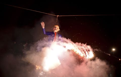Mexicans set fire to an effigy of U.S. Republican presidential candidate Donald Trump in Mexico City during Holy Week celebrations. For many years Mexicans have made and burned cardboard figures of the devil, politicians and others they dislike on the eve of Easter Sunday. 