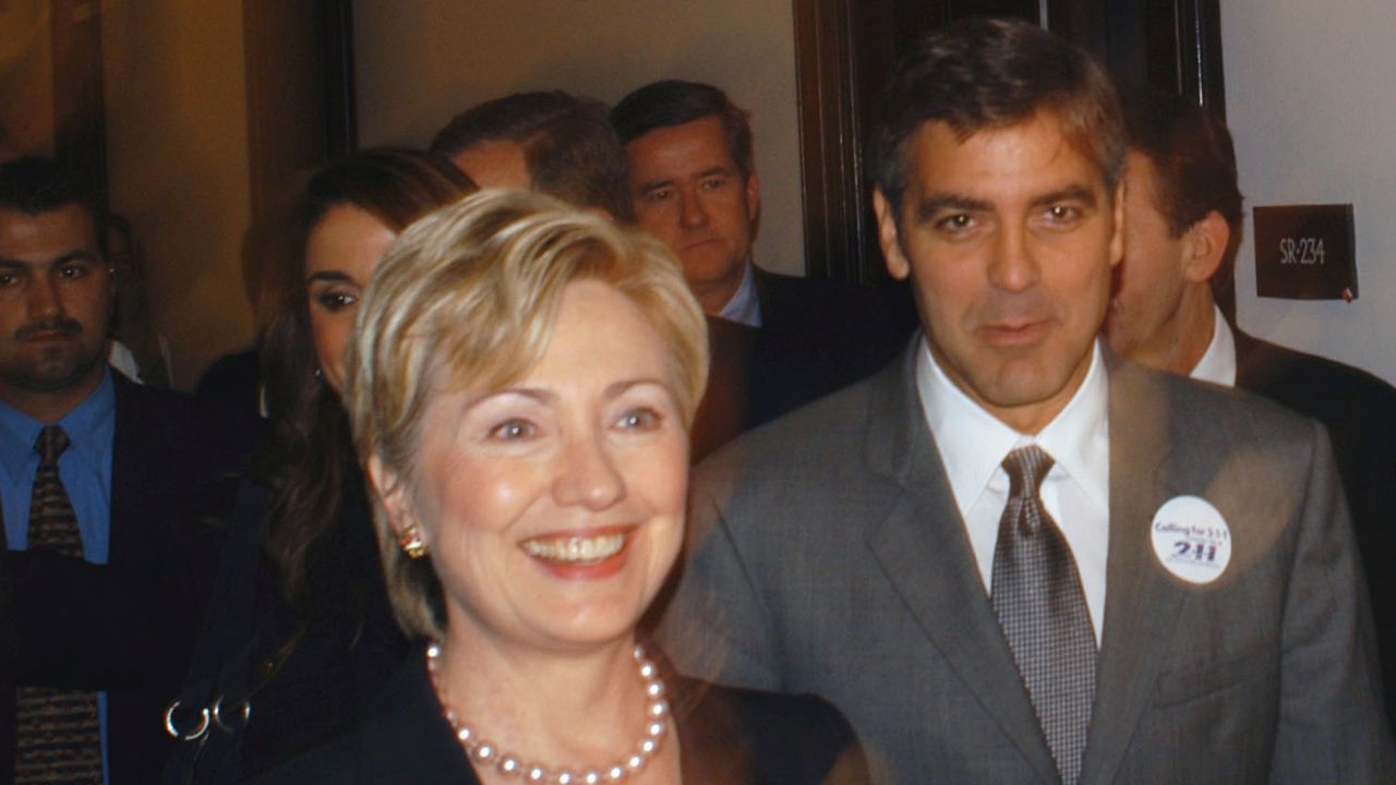 WASHINGTON - SEPTEMBER 17:  U.S. Sen. Hillary Rodam Clinton and actor George Clooney arrive at a United Way news conference to announce the Call for 2-1-1 Act September 17, 2003 in Washington, DC. The number would connect callers to community services and volunteer opportunities.  (Photo by John Falls/Getty Images)                              