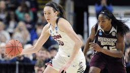 Connecticut's Katie Lou Samuelson, left, and Breanna Stewart, center, start a fast break in front of Mississippi State's Chinwe Okorie during the first half of an NCAA college basketball game in the regional semifinals of the women's NCAA Tournament, Saturday, March 26, 2016, in Bridgeport, Conn. (AP Photo/Jessica Hill)