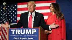 CEDAR RAPIDS, IA - FEBRUARY 1 : Republican presidential candidate Donald Trump speaks with his wife Melania Trump by his side during a campaign event at the U.S. Cellular Convention Center February1, 2016 in Cedar Rapids, Iowa. Trump who is seeking the nomination for the Republican Party attends his final campaign rally ahead of tonight's Iowa Caucus. (Photo by Joshua Lott/Getty Images)