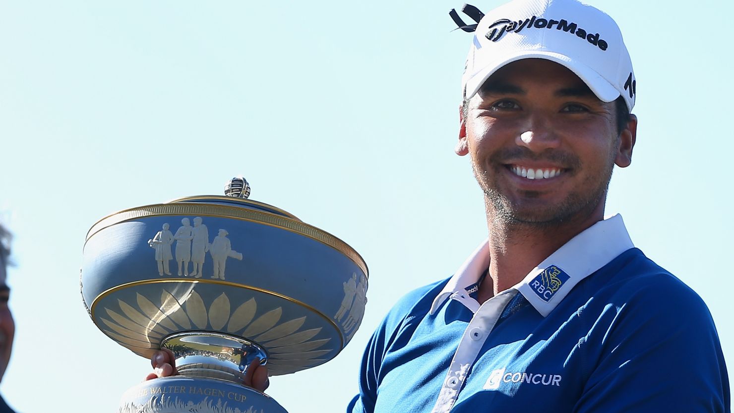 Jason Day holds the Walter Hagen Cup after beating Louis Oosthuizen at the WGC Dell Match Play.