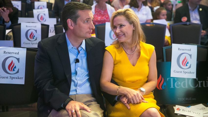 DES MOINES, IA - AUGUST 21: Republican presidential candidate Sen. Ted Cruz (R-TX) chats with his wife Heidi Nelson Cruz at the Religious Liberty Rally he was hosting on August 21, 2015 in Des Moines, Iowa. Earlier in the day Republican presidential candidate Sen. Ted Cruz (R-TX) visited and spoke to guests at the Iowa State Fair.  (Photo by Scott Olson/Getty Images)