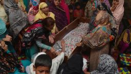Pakistani relatives mourn over the body of a victim during a funeral following an overnight suicide bombing in Lahore on March 28, 2016.

The toll from a suicide blast in Pakistan's Lahore rose to 69, officials said on March 28, as authorities hunted for the "savage inhumans" behind the attack in a park packed with Christian families celebrating Easter Sunday. More than 200 people were injured, many of them children, when explosives packed with ball bearings ripped through crowds near a children's play area in the park in Lahore, leaving dozens dead or bloodied. / AFP / ARIF ALI        (Photo credit should read ARIF ALI/AFP/Getty Images)