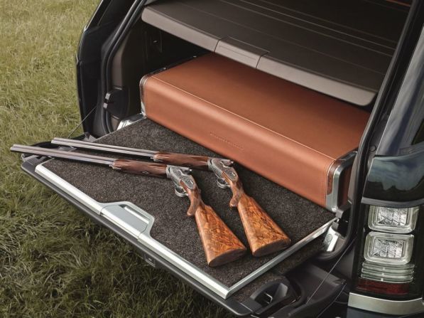 The Holland & Holland Range Rover features a deployable, locking, leather trimmed case designed to hold a pair of shotguns (not included) that feature Holland & Holland's signature acanthus scroll engraving. 