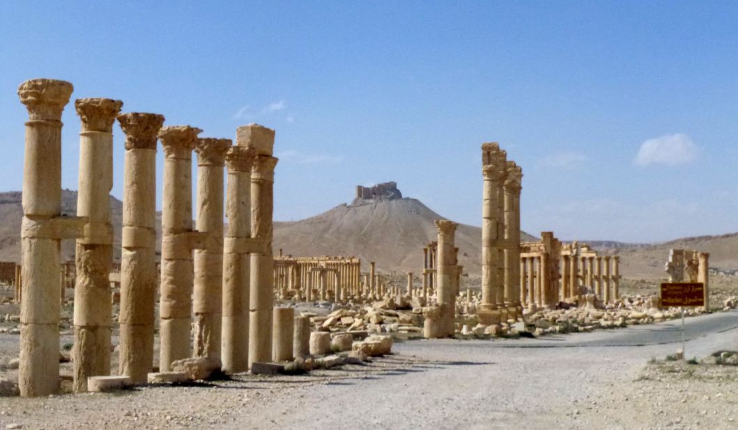Greco-Roman inspired Persian columns remain standing after Syrian troops routed ISIS militants and recaptured the ancient city, once an oasis on a vital caravan route.  