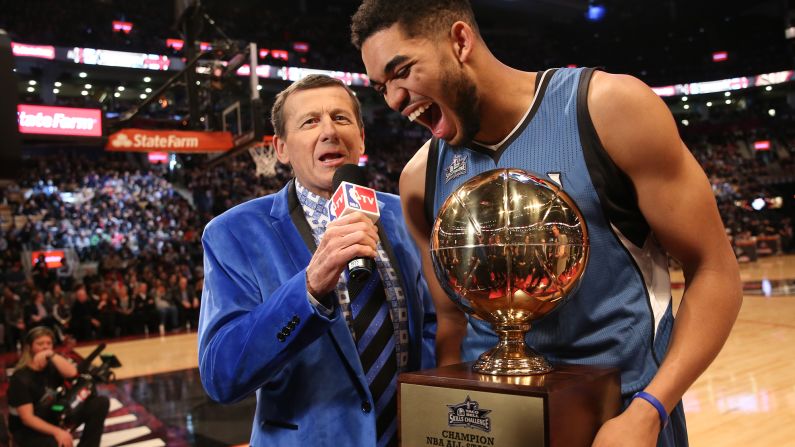 Sager, in a blue velvet jacket, interviews Karl-Anthony Towns of the Minnesota Timberwolves during the 2016 NBA All-Star Game. "Sports are supposed to be fun, and so I have fun with the way I dress," <a href="index.php?page=&url=http%3A%2F%2Fbleacherreport.com%2Farticles%2F2383247-craig-sagers-harrowing-and-emotional-journey-back-to-the-nba" target="_blank" target="_blank">Sager said.</a>