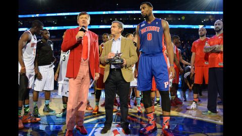 Sager with Andre Drummond and Angel Cano at a charity game in 2014. He had a walk-in closet for his outfits at his home in Canton, Georgia, and he tried to never wear the same jacket-and-tie combo twice.