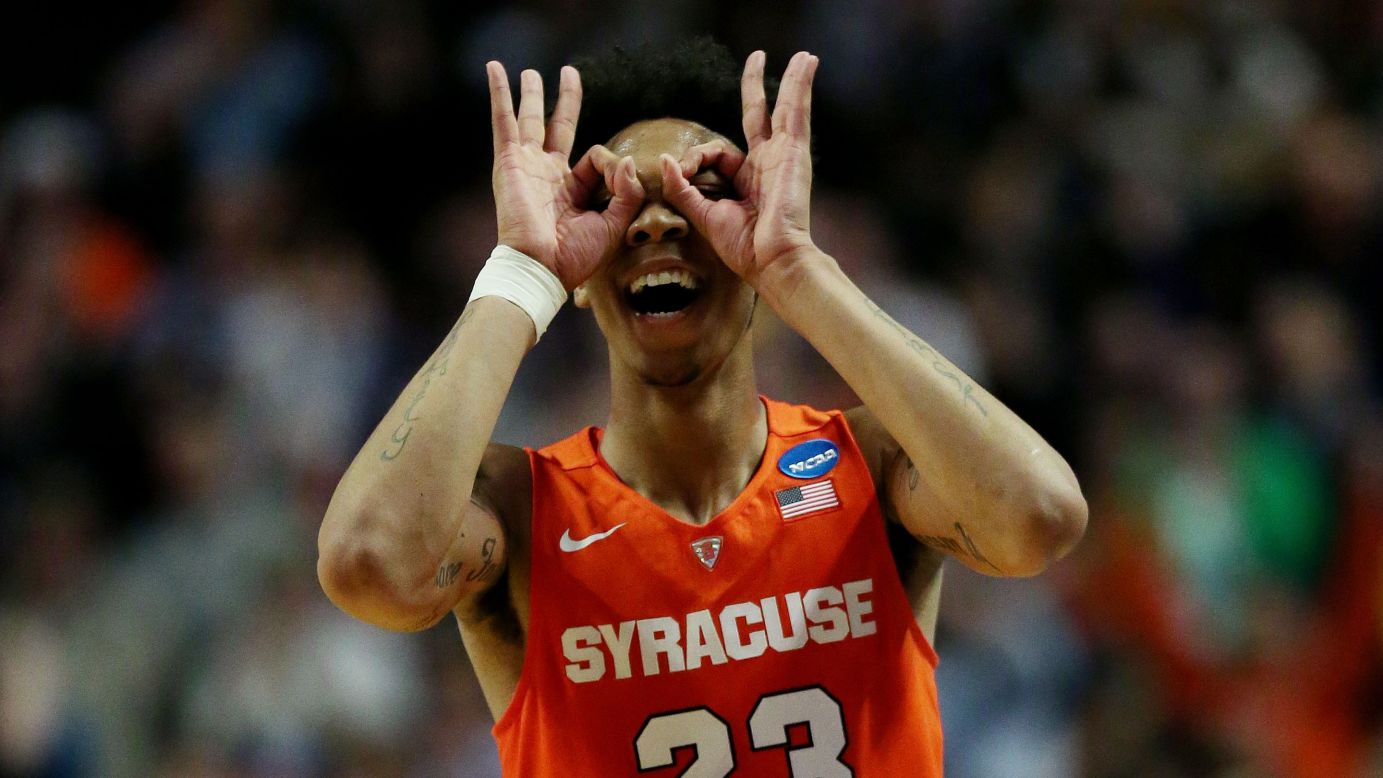 Malachi Richardson celebrates a 3-pointer during Syracuse's 68-62 victory over Virginia on Sunday, March 27. Richardson, a freshman, scored 21 second-half points as the Orange came back from 16 down to clinch a spot in the Final Four.