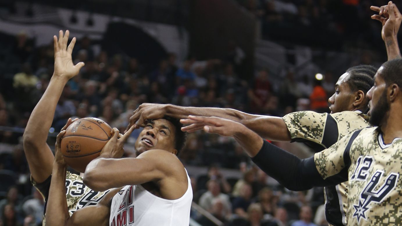 Miami's Hassan Whiteside has his shot blocked during an NBA game in San Antonio on Wednesday, March 23.