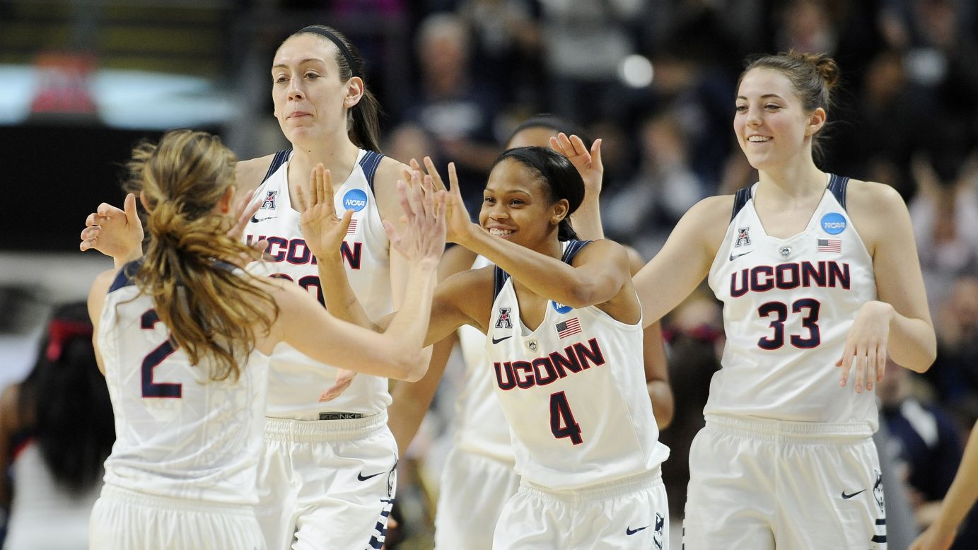 Connecticut basketball players -- from left, Briana Pulido, Breanna Stewart, Moriah Jefferson and Katie Lou Samuelson -- celebrate after thrashing Mississippi State in the NCAA Tournament on Saturday, March 26. The undefeated Huskies won 98-38, a record margin of victory for the Sweet 16. UConn has won the last three NCAA titles.