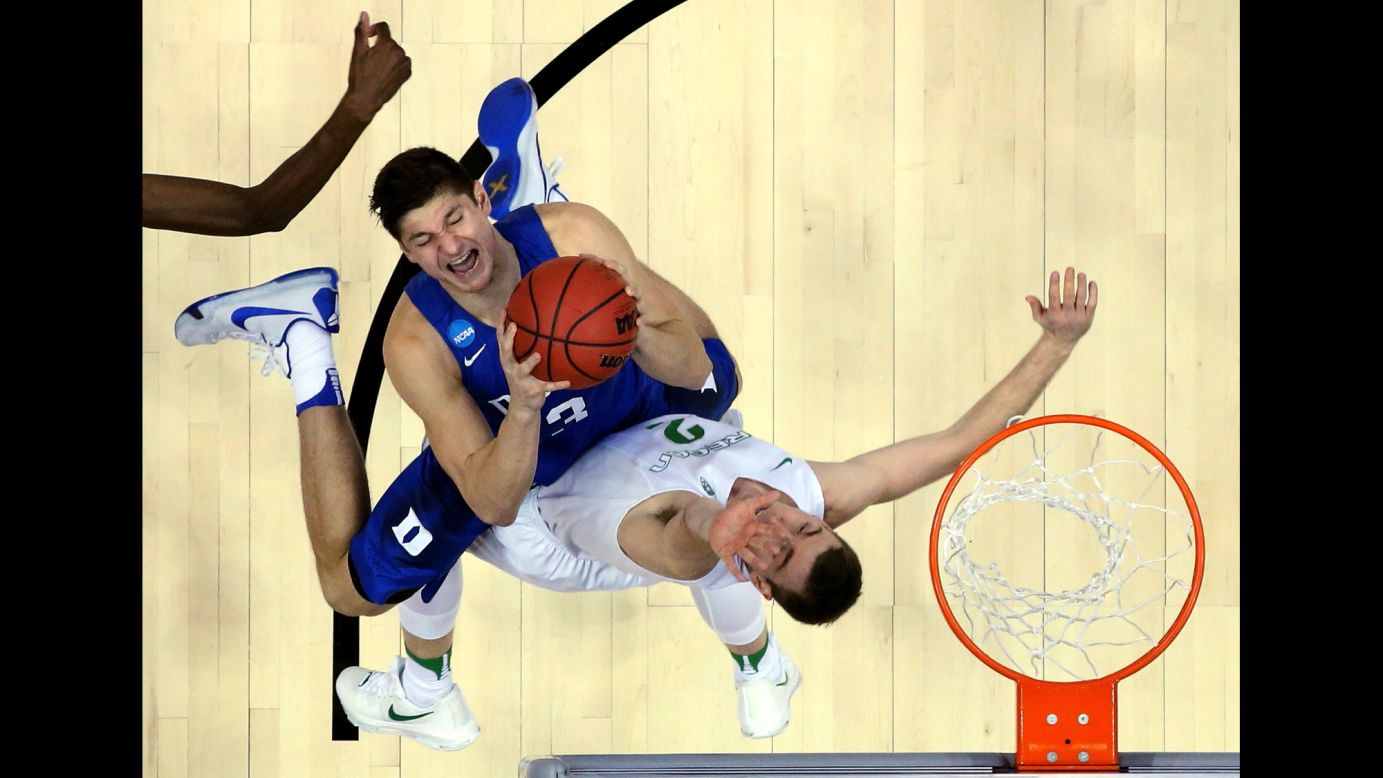 Duke's Grayson Allen goes up for a shot against Oregon's Casey Benson during an NCAA Tournament game on Thursday, March 24. Oregon won 82-68 to advance to the Elite Eight.