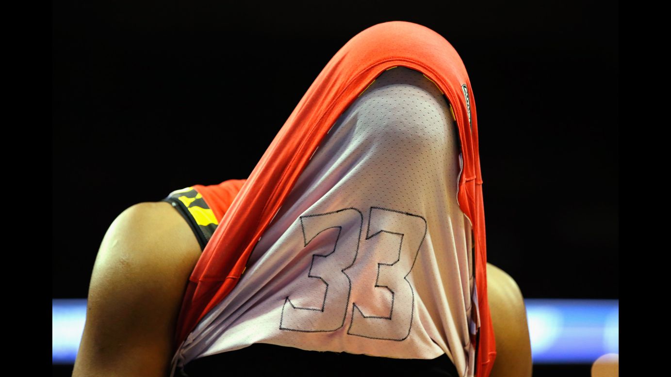 Maryland center Diamond Stone covers his head with his jersey after the Terrapins were knocked out of the NCAA Tournament by Kansas on Thursday, March 24.