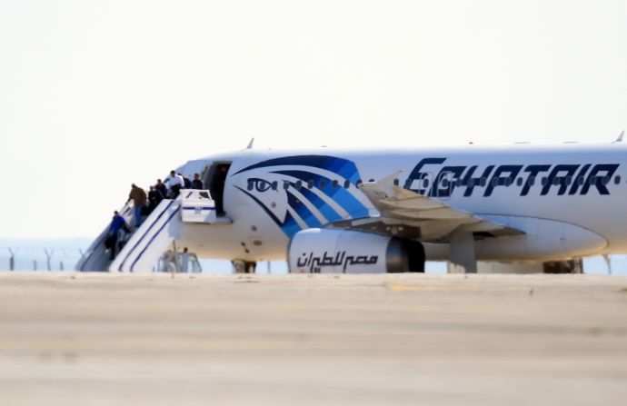 EgyptAir Flight 181 en route to Cairo from Alexandria <a href="index.php?page=&url=http%3A%2F%2Fwww.cnn.com%2F2016%2F03%2F29%2Feurope%2Fhijacked-egypt-air-jet%2Findex.html">was hijacked and diverted to Cyprus</a> in 2016. Here, some passengers disembark on the tarmac at Larnaca International Airport in Cyprus. All the passengers eventually were released and the hijacker arrested, according to the airline and Cypriot authorities.
