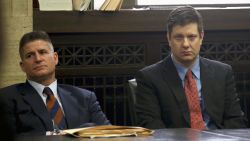 Chicago Police officer Jason Van Dyke, right, charged with murder in the 2014 videotaped shooting death of black teenager Laquan McDonald, sits in court with his attorney, Dan Herbert, at the Leighton Criminal Court Building in Chicago on Wednesday, March 23.