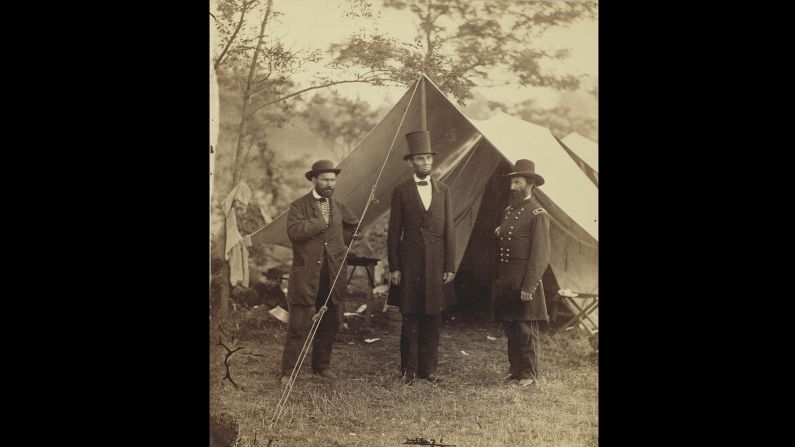 U.S. President <a href="index.php?page=&url=http%3A%2F%2Fwww.cnn.com%2F2015%2F06%2F18%2Fus%2Fgallery%2Ftbt-abraham-lincoln-portraits%2F" target="_blank">Abraham Lincoln,</a> center, was photographed by Alexander Gardner on the Antietam battlefield in Maryland. The Scottish-born Gardner immigrated to the United States at the beginning of the Civil War. He became friends with Allan Pinkerton, left, who was a private investigator and head of the Union Intelligence Service.