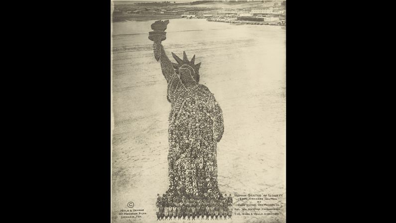 Arthur Mole became famous during World War I when he started making "living photographs," where tens of thousands of military personnel were arranged to form compositions. The "Human Statue of Liberty," made in 1918, involved 18,000 people from Camp Dodge in Des Moines, Iowa. It was created with the help of John D. Thomas.