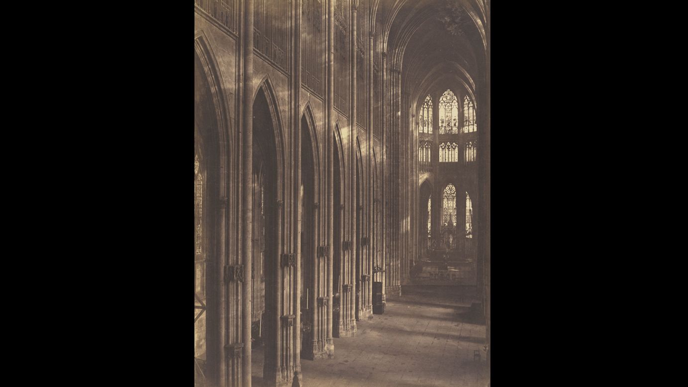 This photo was taken in 1857 at the Church of St. Ouen in Rouen, France. Photographer Louis-Auguste Bisson and his brother, Auguste-Rosalie, worked with large-format cameras using a wet-plate process that made glass negatives. When photographic postcards became popular, the Bissons refused to make small prints of their work and they were forced to close their studio.