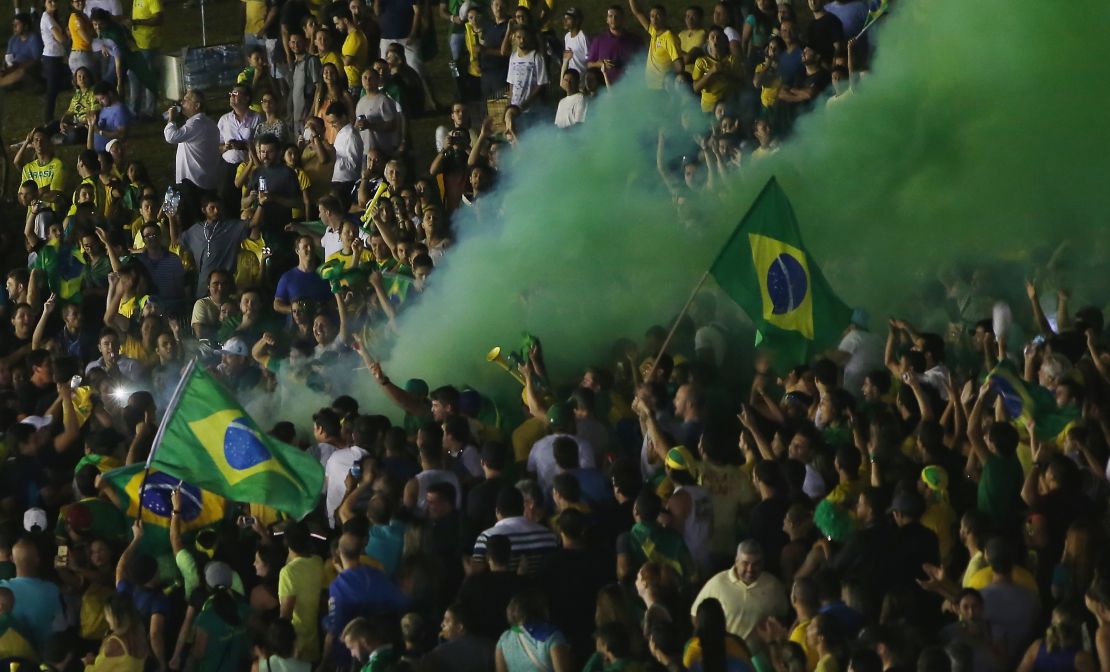 Anti-government protesters demonstrate outside the National Congress in Brasilia.