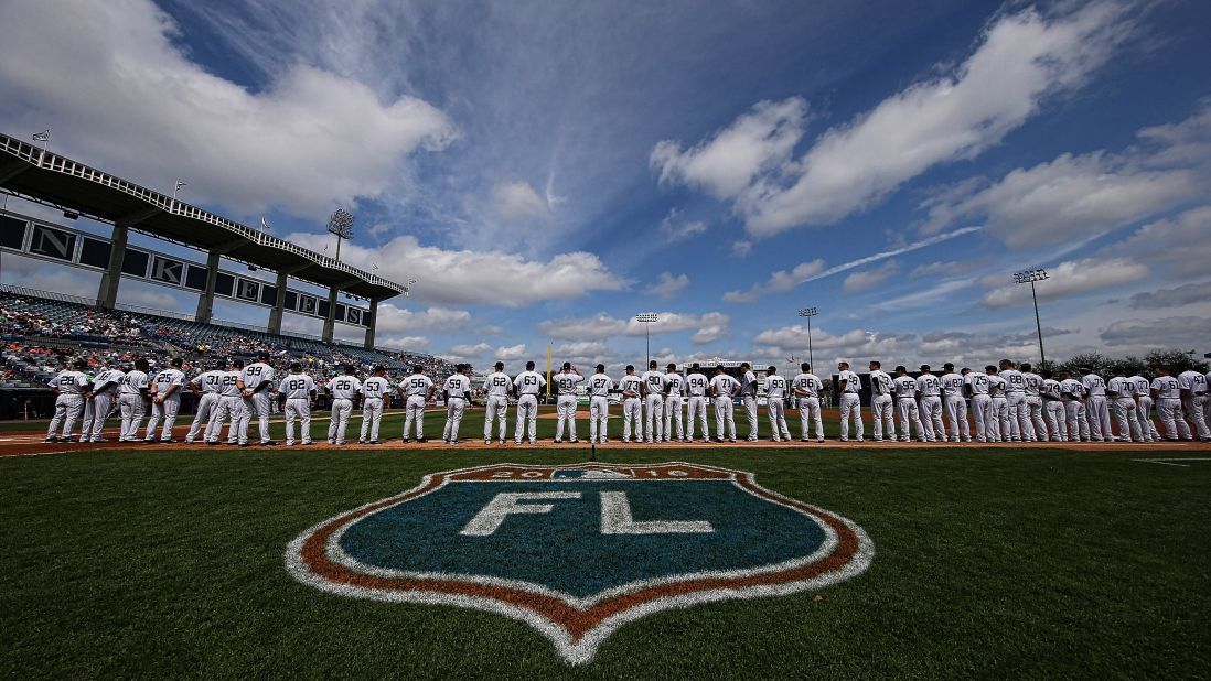 Members of the New York Yankees line up for the national anthem prior to the start of a game in Tampa, Florida, on March 2.