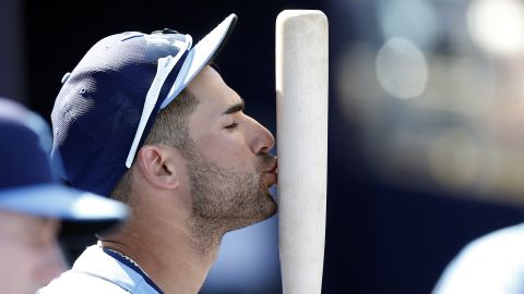 Tampa Bay's Kevin Kiermaier kisses his bat in the dugout during a game in Port Charlotte, Florida, on March 9.