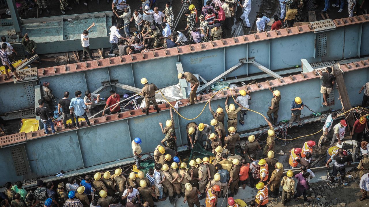 Rescue workers and volunteers try to free people on March 31.