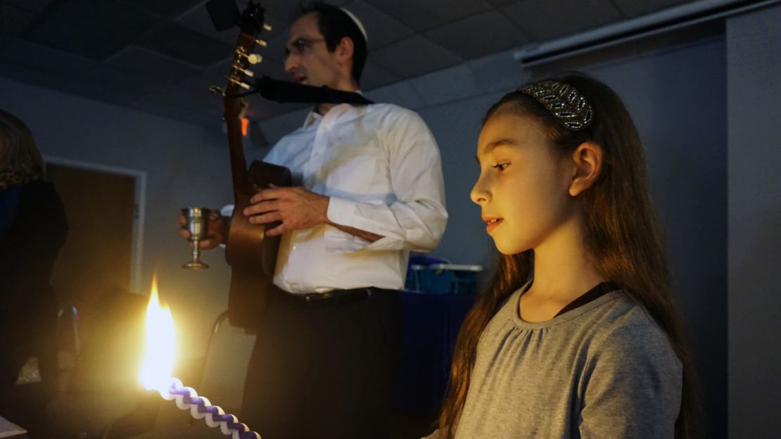 Rabbi Menashe East, shown with his daughter Ayala, hired Kagedan at Mount Freedom Jewish Center.