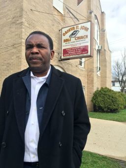 Pastor Ira Acree outside his West Side church.