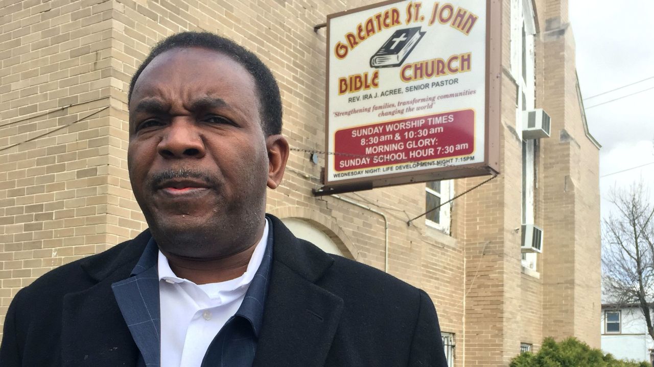 Pastor Ira Acree outside his West Side church.