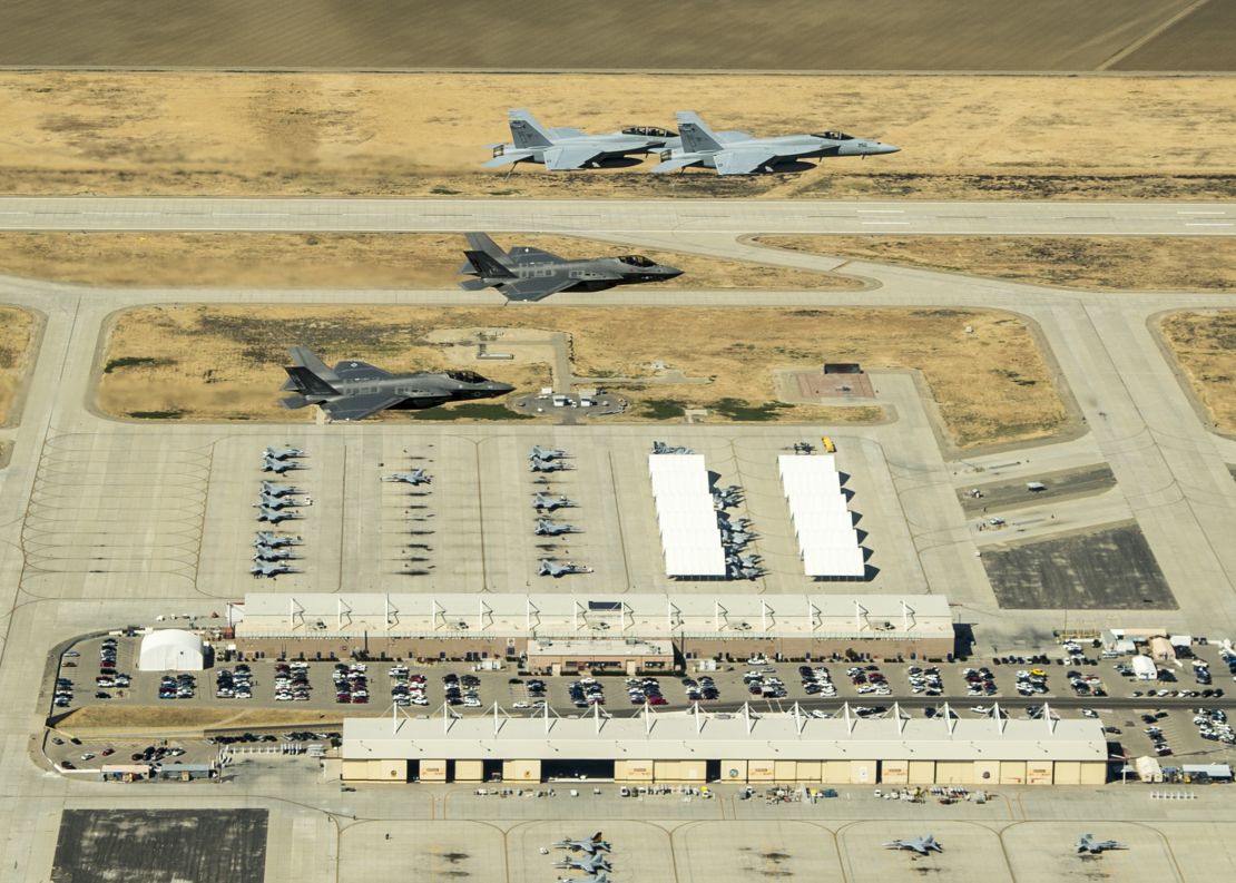 F-35C Lightning II aircraft fly in formation over the naval base with F/A-18E/F Super Hornets last year.